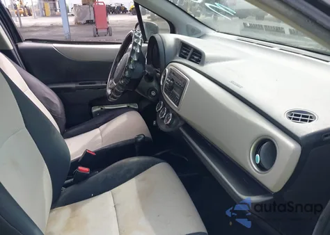 2012 Toyota Yaris Le z USA, uszkodzony, nr VIN JTDKTUD31CD510012